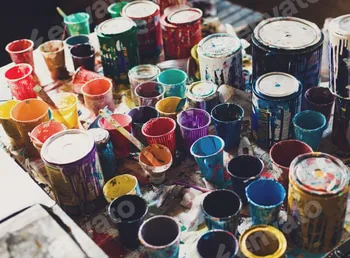 multicolored cans with paint, arts background