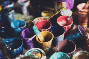 multicolored cans with paint, arts background