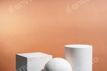 White geometric shapes arranged stylishly on a soft peach background in a minimalist setting 5 White geometric shapes arranged stylishly on a soft peach background in a minimalist setting