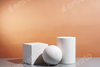 White geometric shapes arranged stylishly on a soft peach background in a minimalist setting