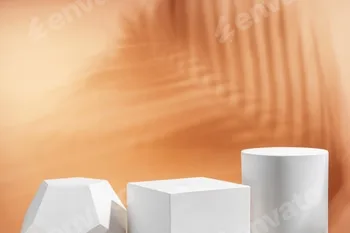 White geometric shapes arranged stylishly on a soft peach background in a minimalist setting