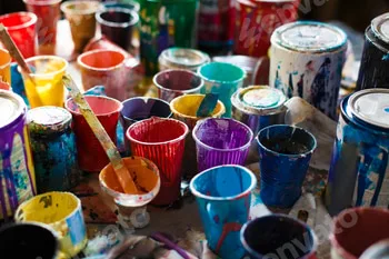 multicolored cans with paint, arts background