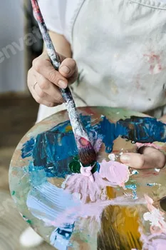 A mature artist creating a colorful masterpiece in her cozy art studio 24 A mature artist creating a colorful masterpiece in her cozy art studio