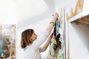 Artist at work in a bright studio