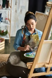 Focused artist in a creative space