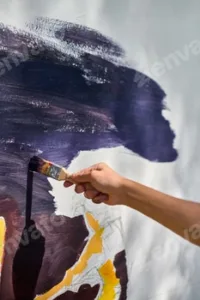 Hand painting abstract art on canvas outdoors