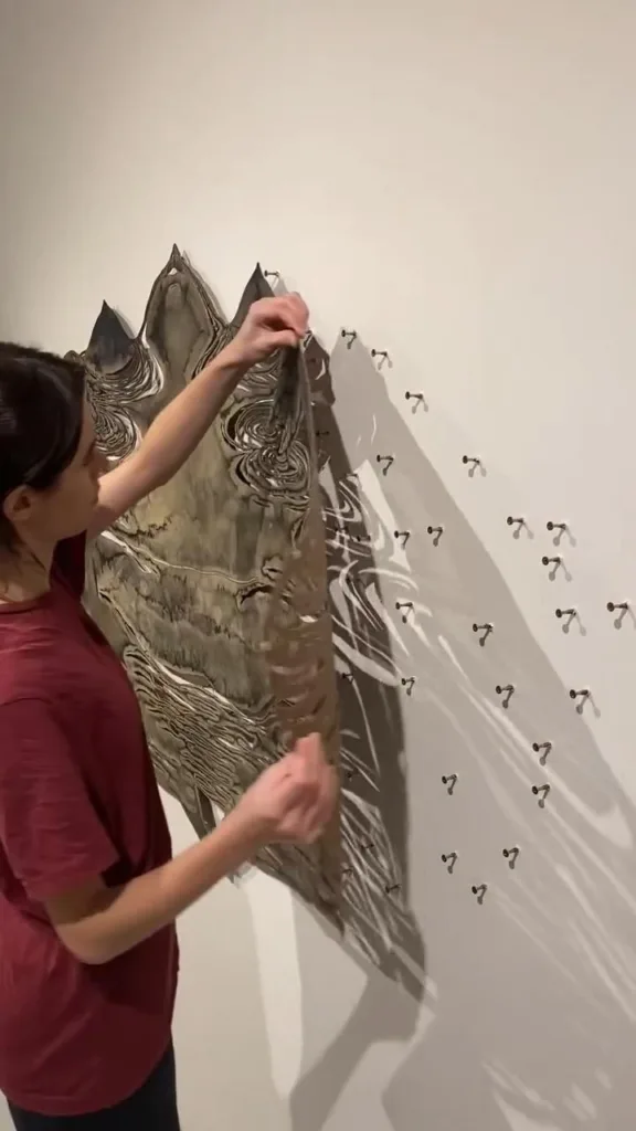 Julia Gallo's wall art is a stunning assembly with a twist—paired with #ASMR crunchy vibes 🧲. 5 92d4143fa687d6c72568d80acd9b5341