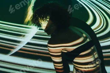 Woman on background of projection of lines.