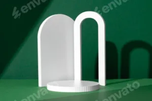 Modern White Architectural Shapes Against A Deep Green Background Displayed On A Simple Table
