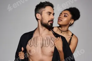 A passionate embrace between a couple in a stylish setting showcasing love and intimacy